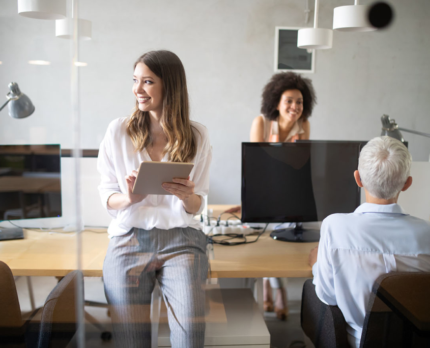 three workers in an office
