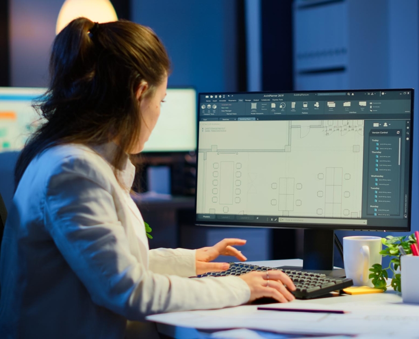 Back view of a person using a printing software