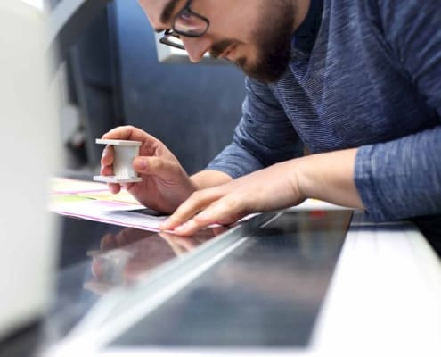 man viewing a document close up