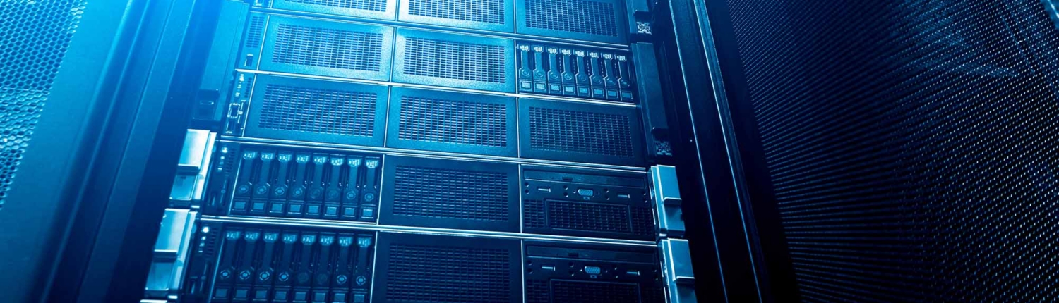 Bottom View Of Rack Server Against Neon Fluorescent Light In Data Center