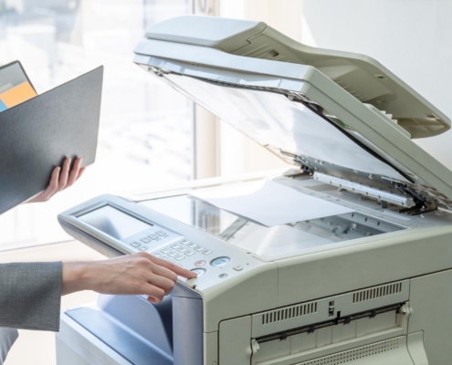 Worker Using Office Printer