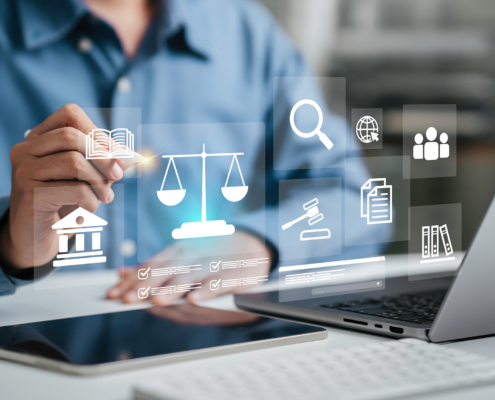 Hand Of The Businessman Or Lawyer With Legal Services Icon On The Laptop